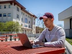 Montclair student working on laptop